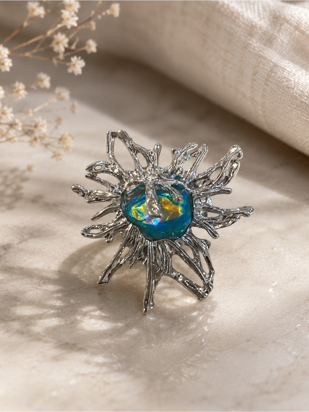 paparazzi Iridescent Blue-Green Sunburst Statement Ring